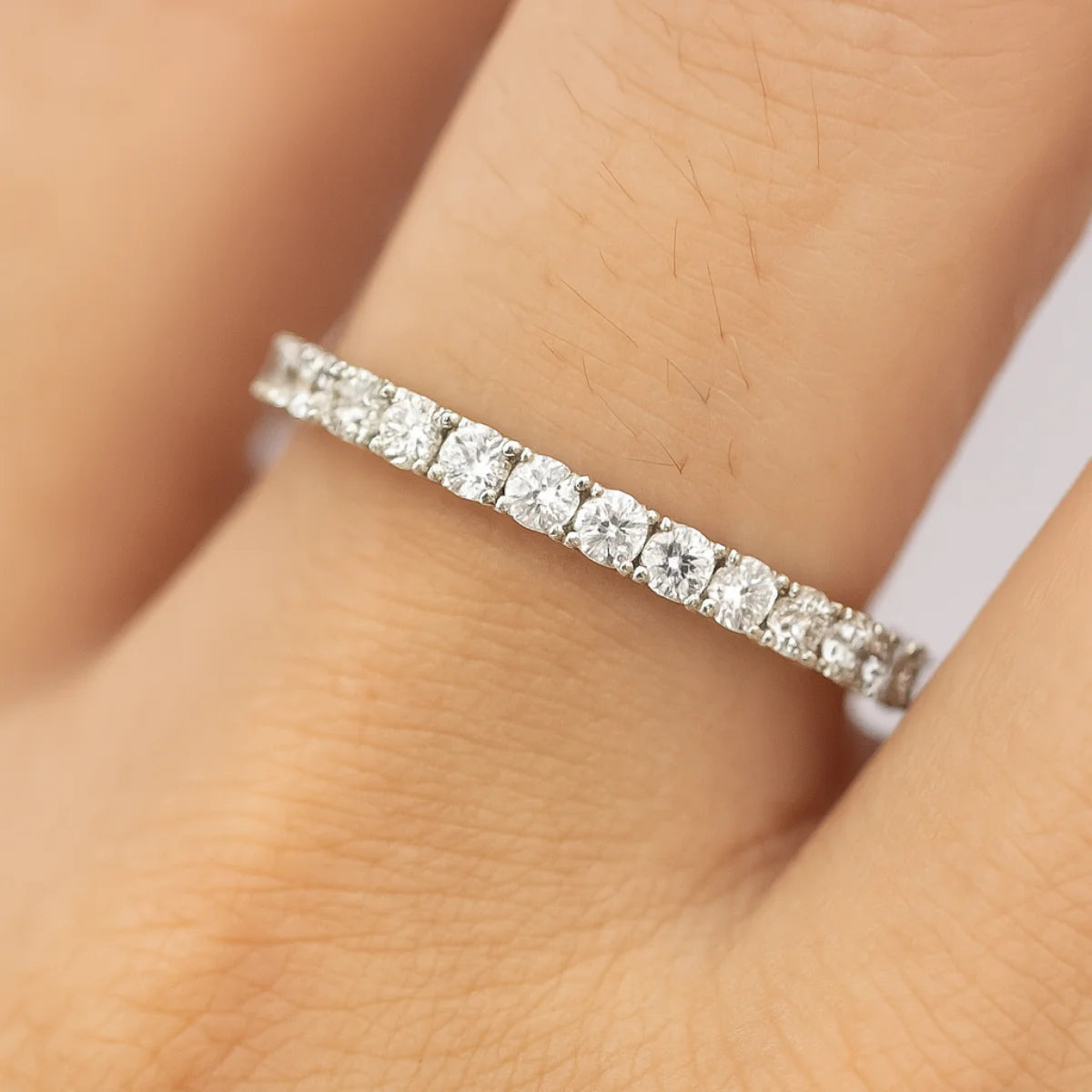 Silver ladies ring with half moissanite