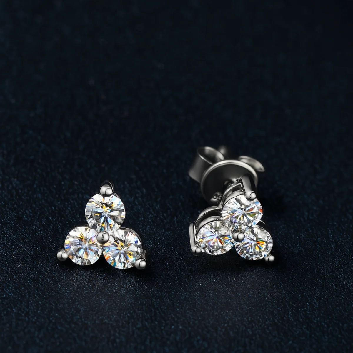 Silver earrings with moissanite trio