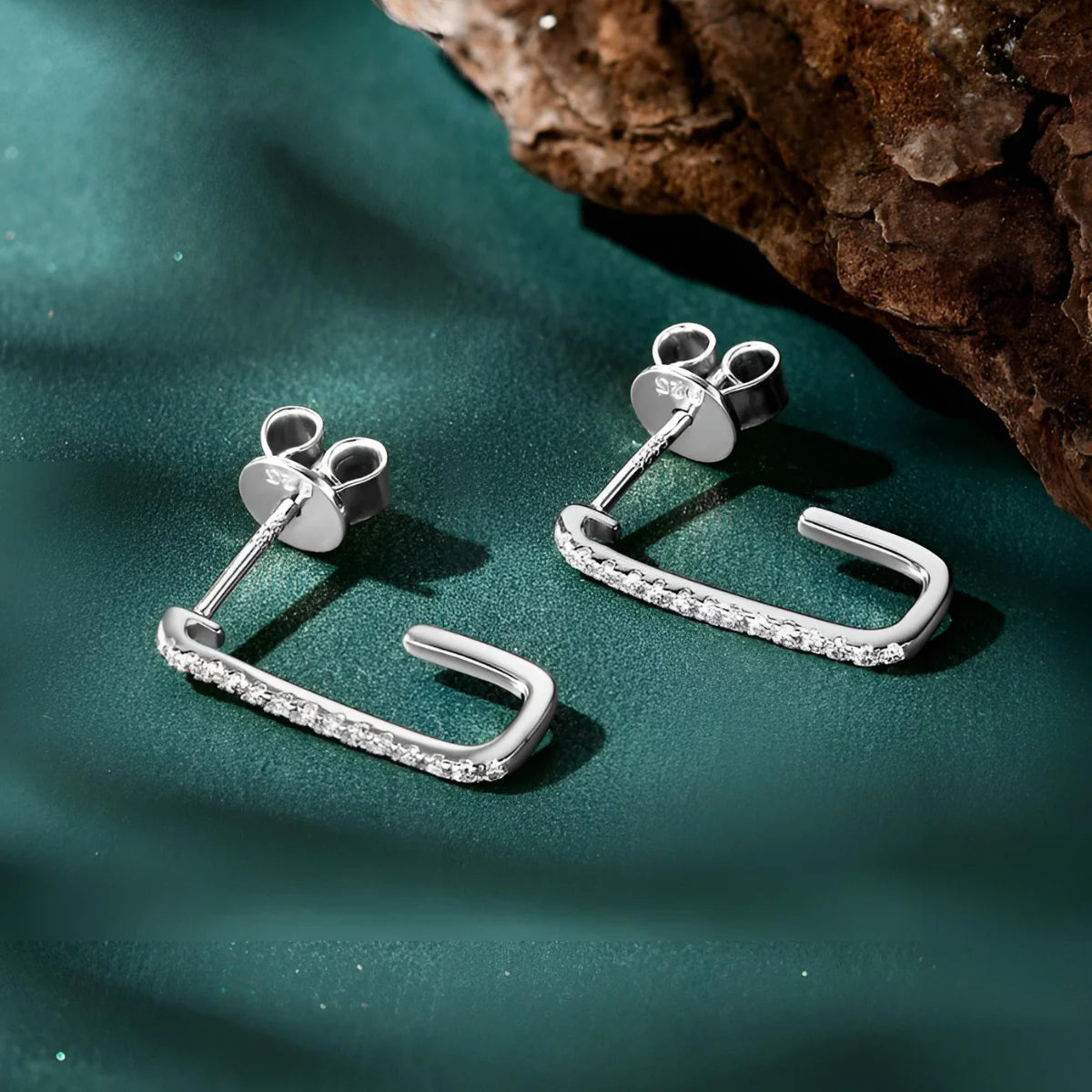 Women's earrings white gold half hoops with moissanite